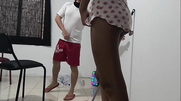 The cleaning worker seduces his boss during working hours. The man sensually touches his boss and sucks her tits